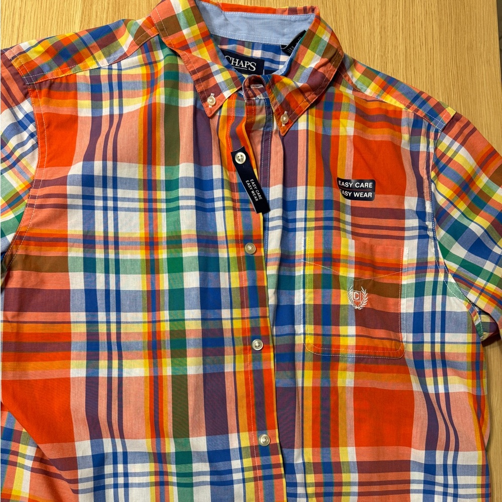 Two plaid chaps, easy care, short sleeve shirts. Large, unworn.
